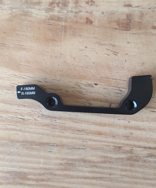 Adaptador lateral para disco 180mm